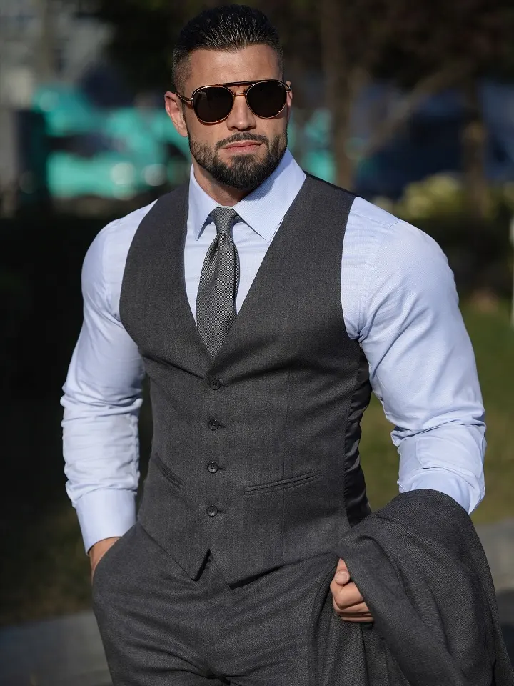 21 Classy Outfits for Men That Look Far More Expensive 8 Charcoal Waistcoat And Blue Shirt