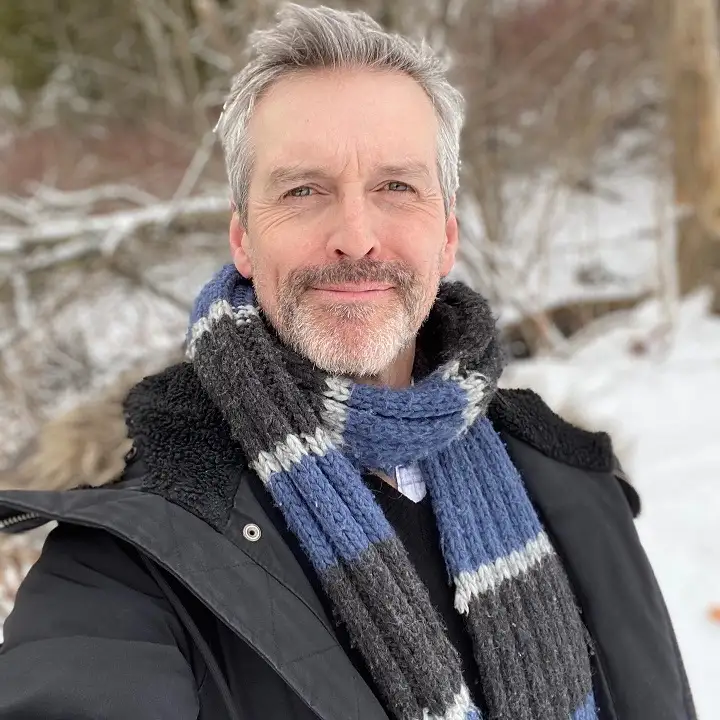 Grey Hair Styles for Men Over 50: 18 Looks That Command Respect 11 A Side Part That Holds Its Wave Even Bundled Up for Winter