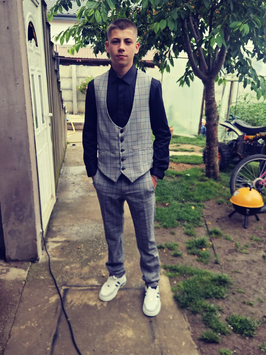 13. Plaid Waistcoat Suit and Sneakers