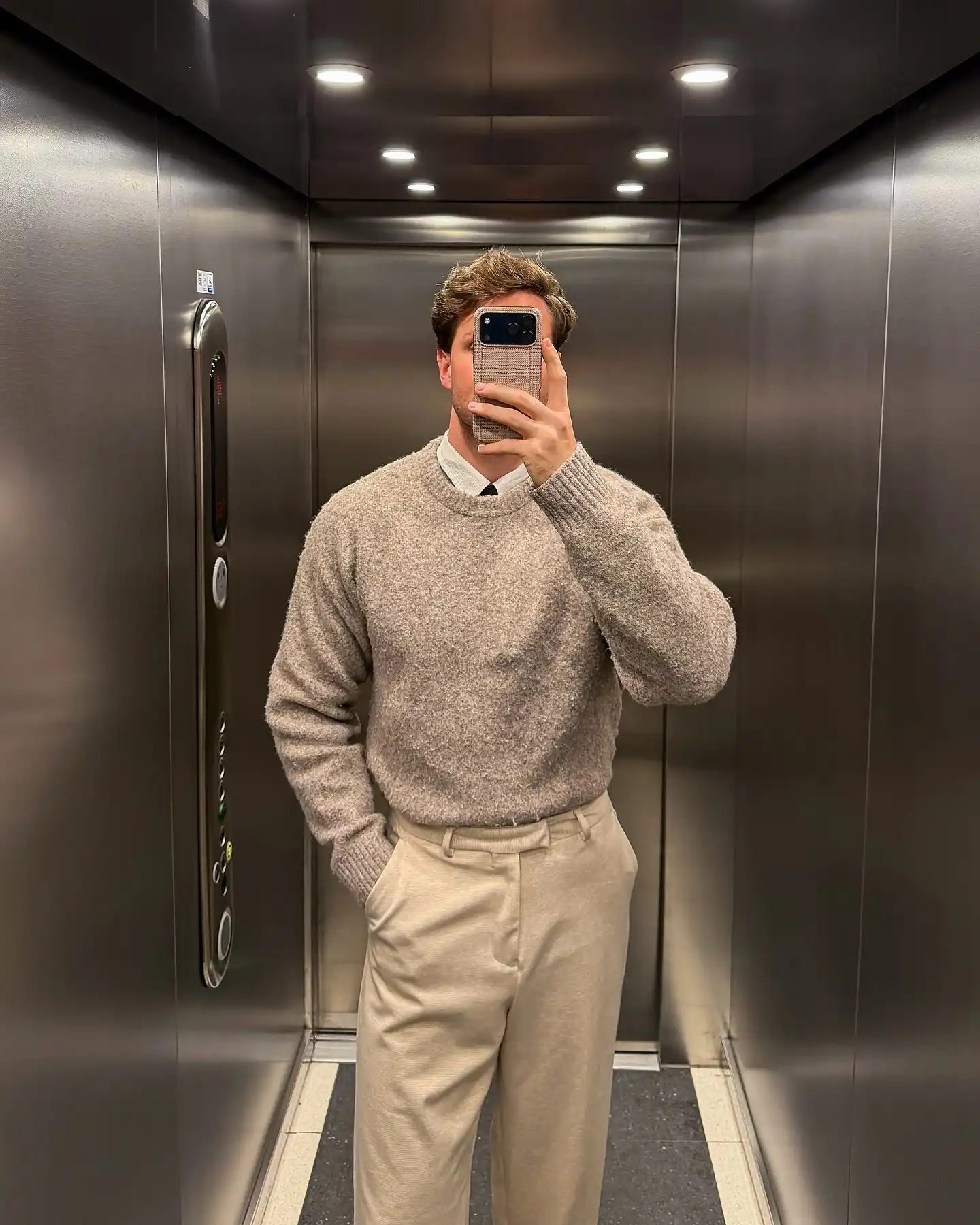 16. Oatmeal Crewneck Sweater and Beige Trousers