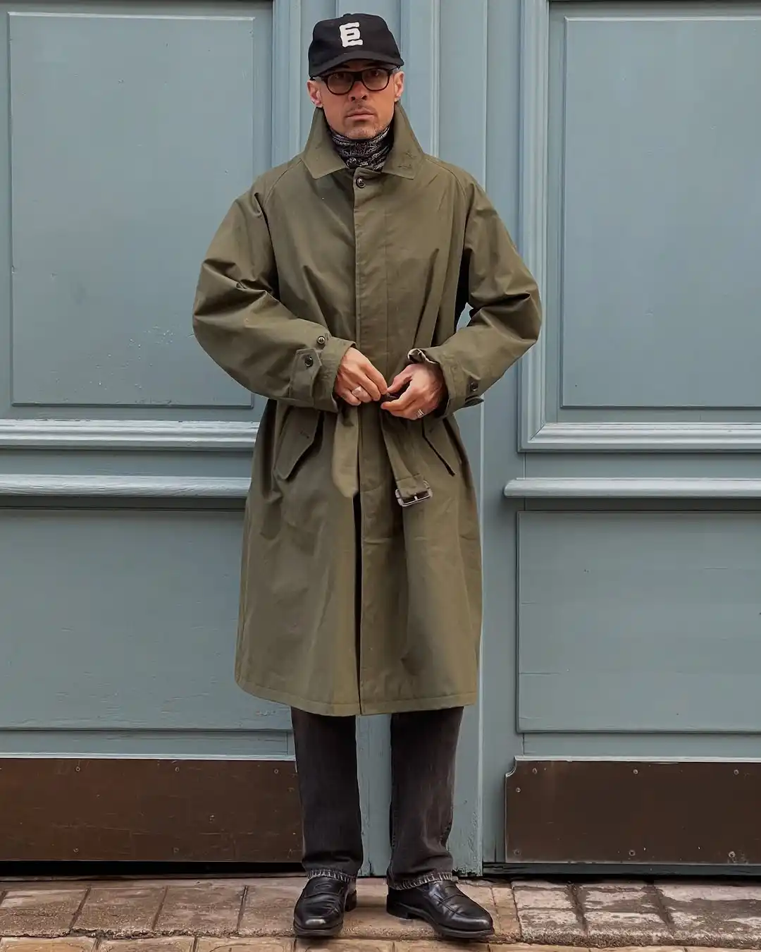 15 Classy Winter Outfit Combos for Men 6 4. Belted Olive Mac Coat and Dark Trousers