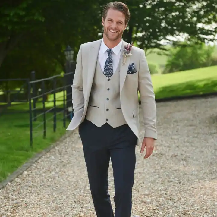 2. Tan Blazer with Navy Trousers and Vest