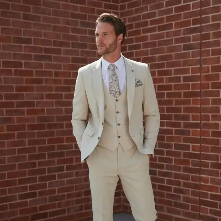5. Beige Three Piece Suit with Floral Tie