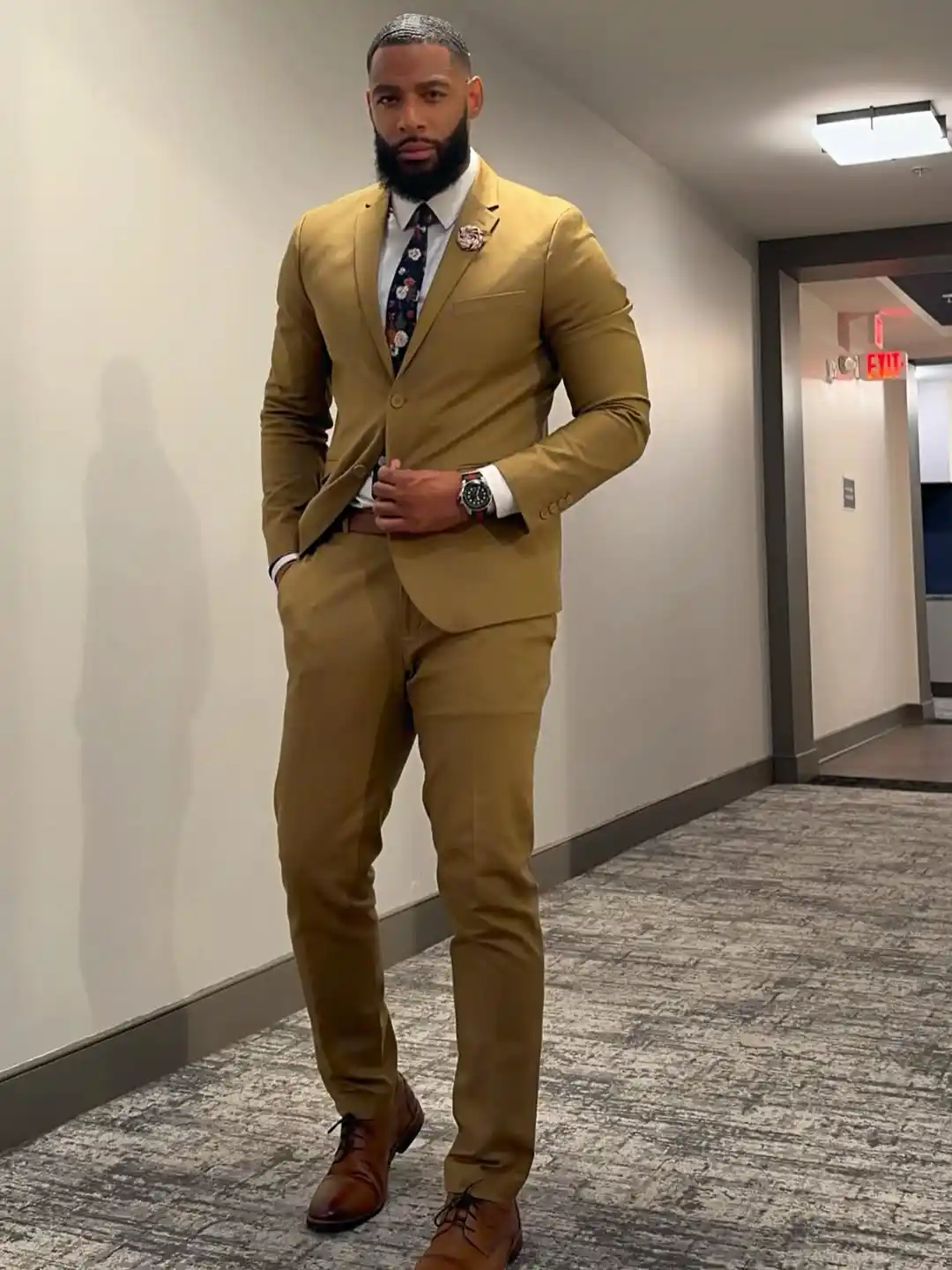 4. Mustard Suit with Floral Tie