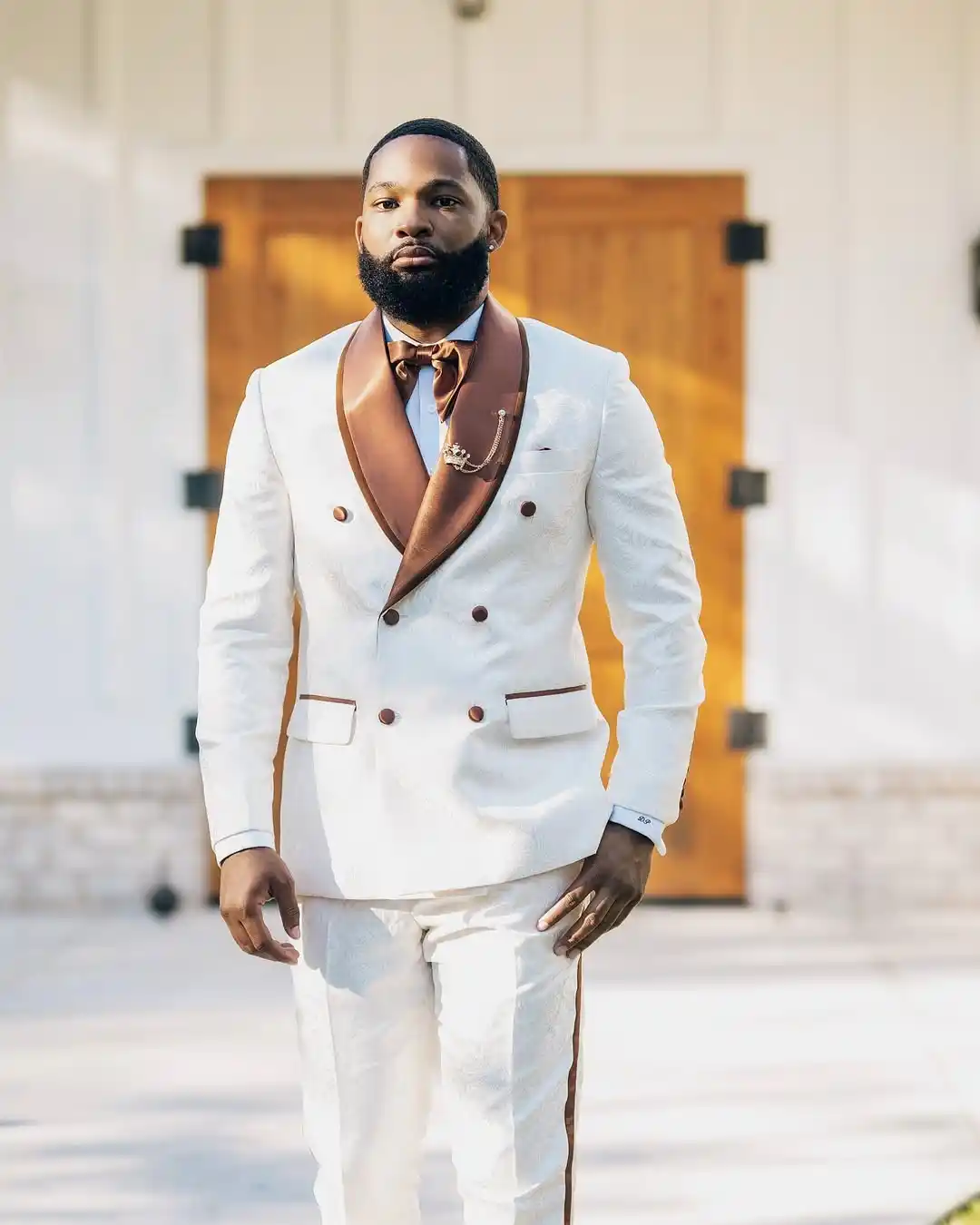 9. White Textured Suit with Copper Lapel