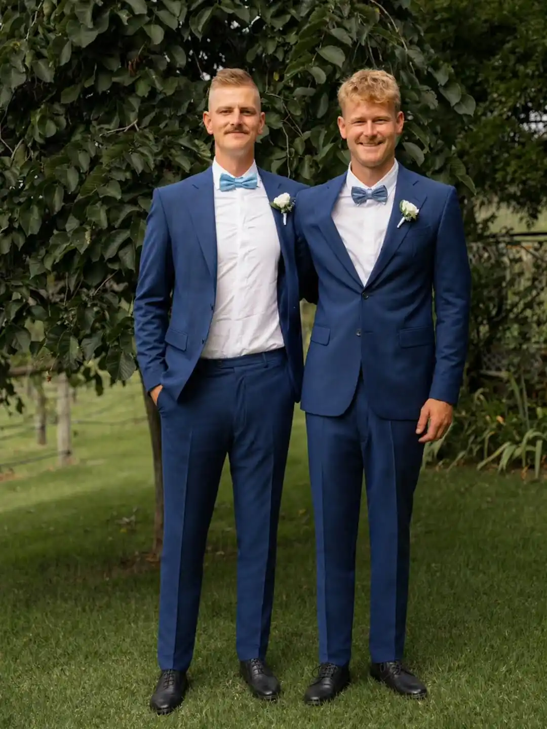 1. Navy Suit with Blue Bow Tie