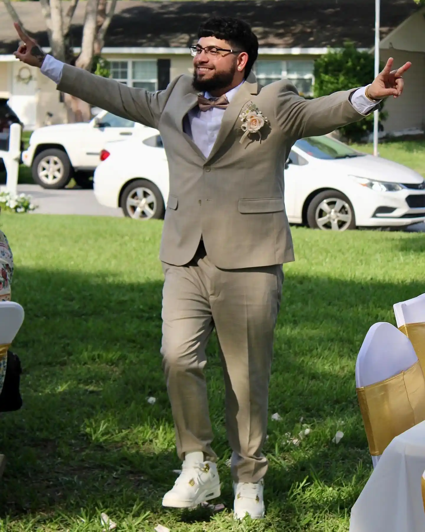 Wedding Guest Outfit for Plus Size Men: 15 Stylish Ideas 12 7. Tan Suit with Bow Tie and Sneakers