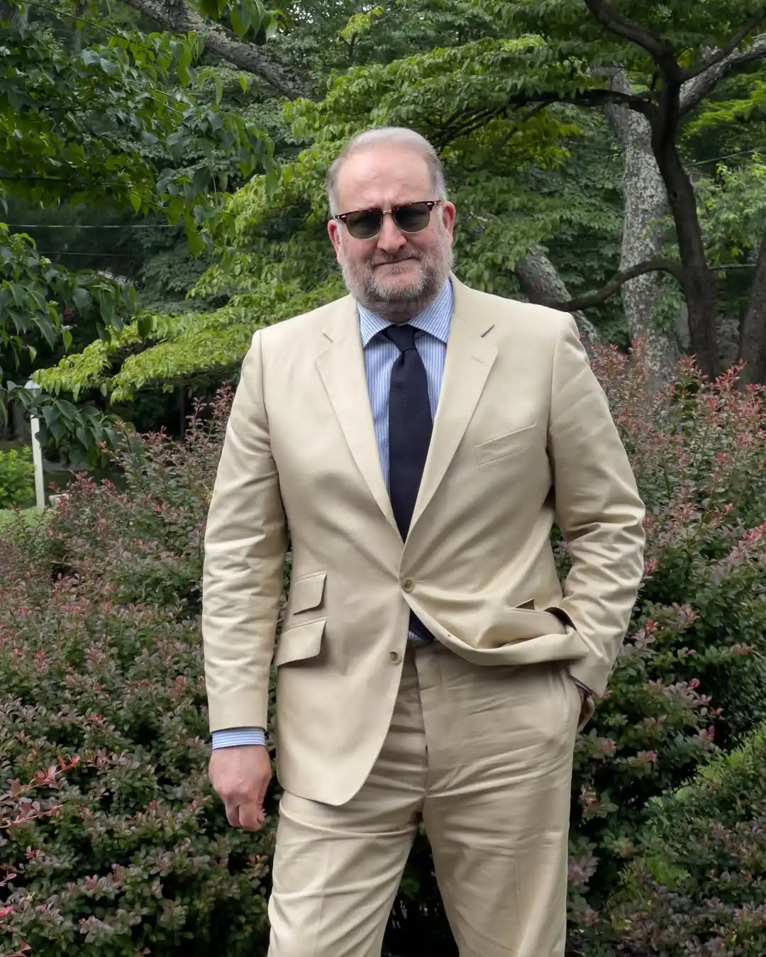 12. Tan Suit with Striped Shirt and Navy Tie
