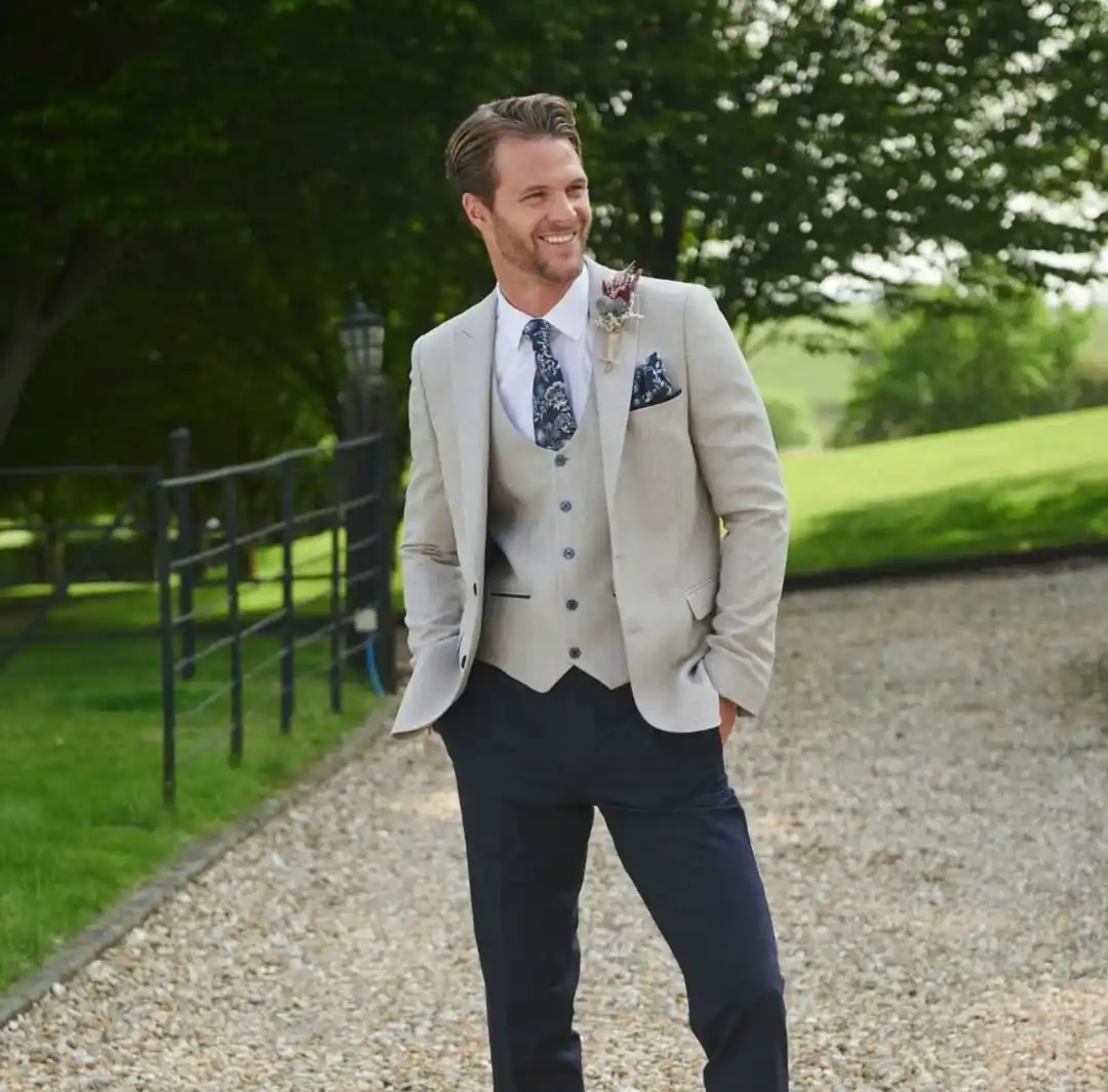 2. Beige Blazer with Navy Trousers