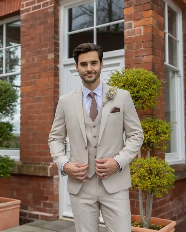 2. Beige Three Piece Suit With Boutonniere