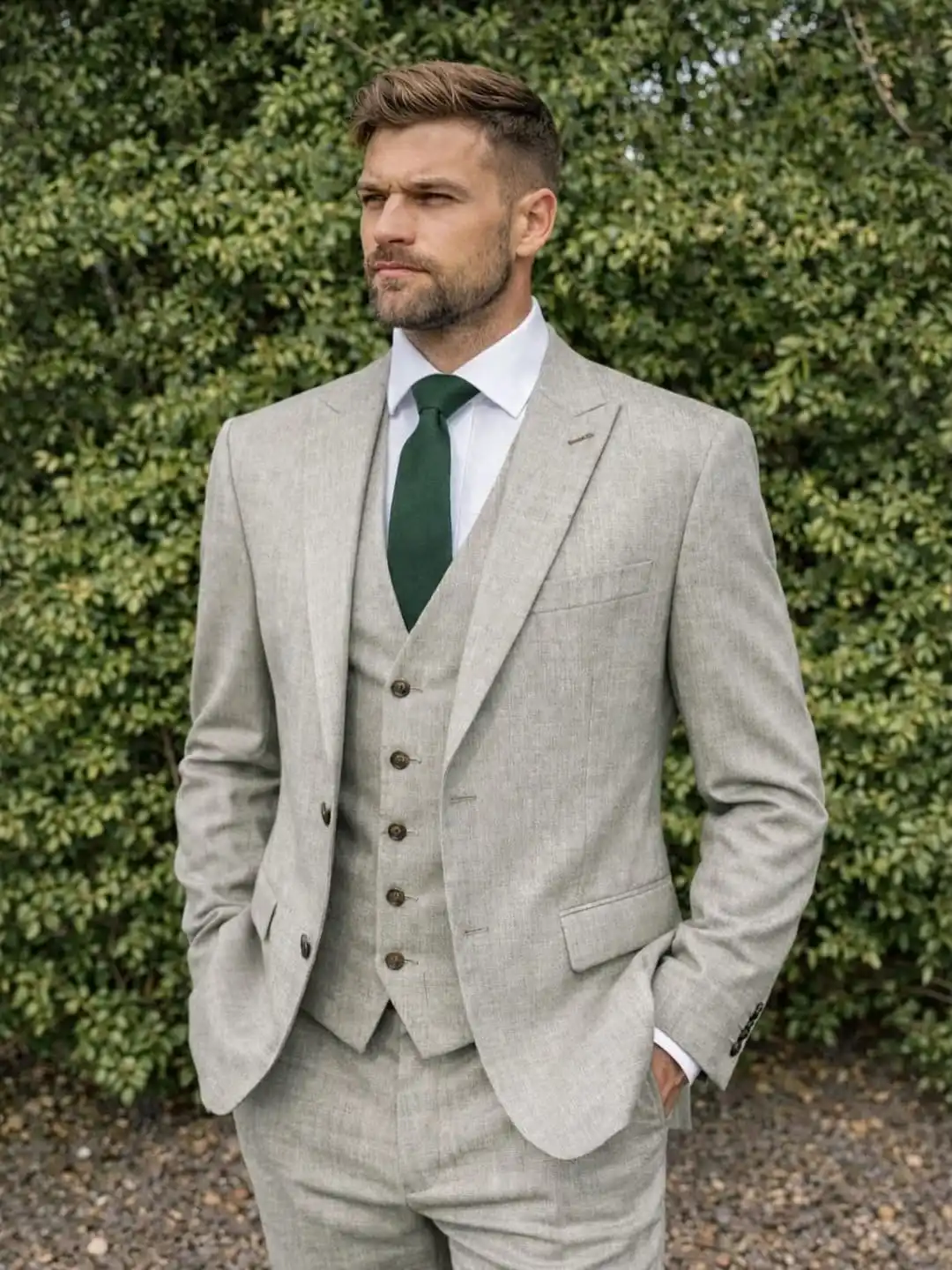 13. Grey Three Piece Suit With Green Tie