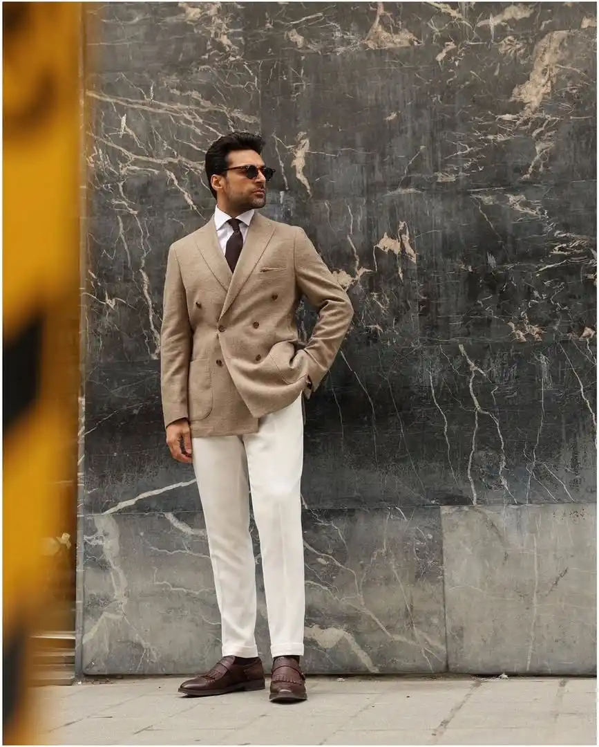 15 Winter Wedding Guest Outfit Ideas for Men 13 11. Beige Double Breasted Blazer with White Trousers