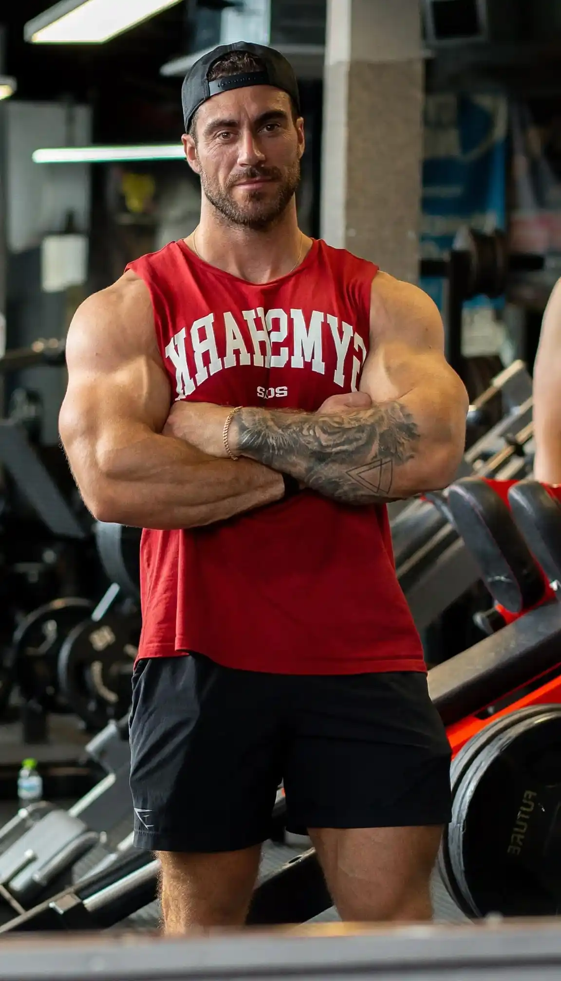 10. Red Muscle Tank with Collegiate Lettering