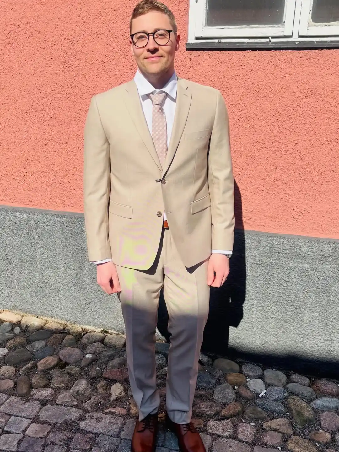 4. Tan Suit with Pink Patterned Tie