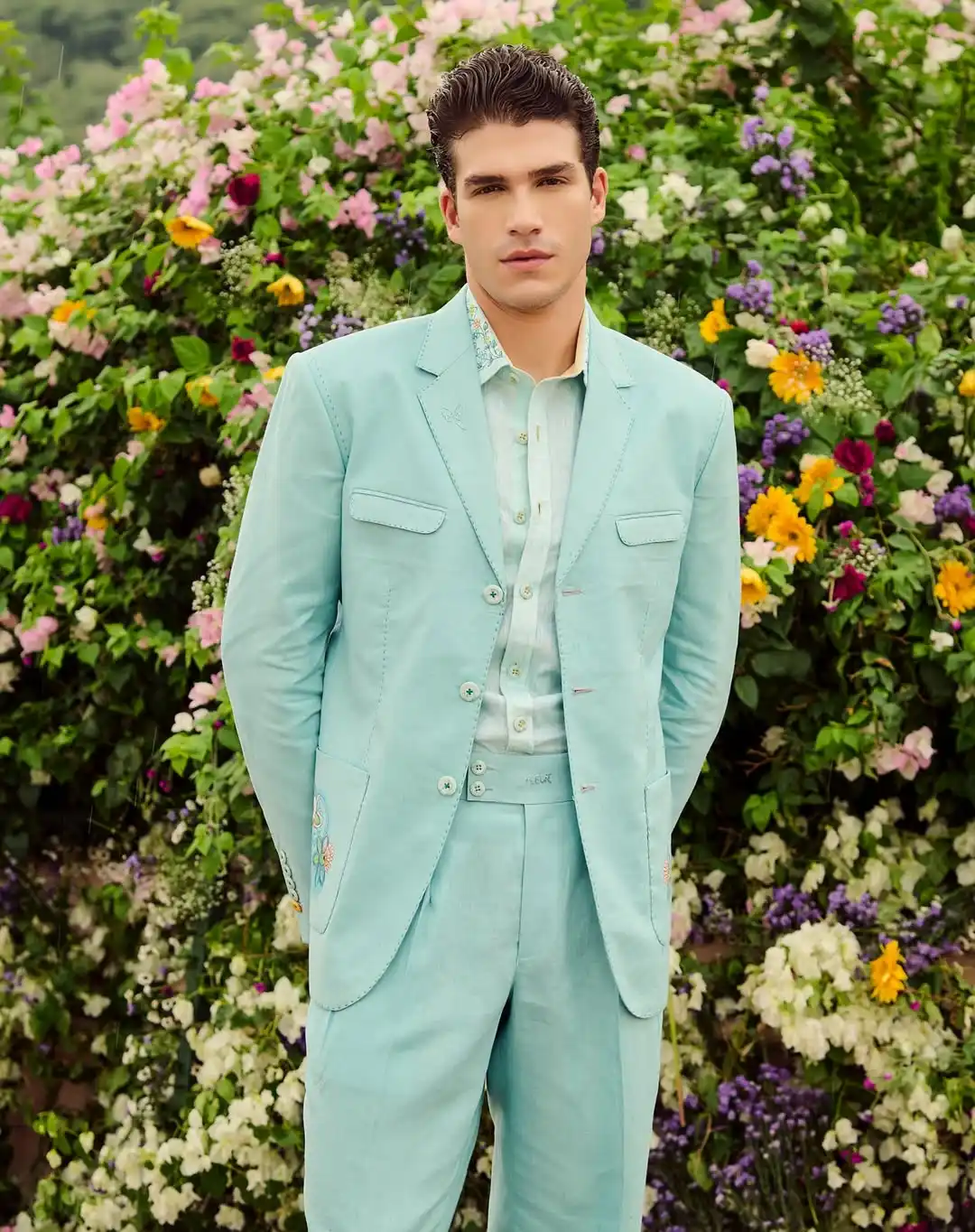 10. Mint Green Suit With Floral Backdrop