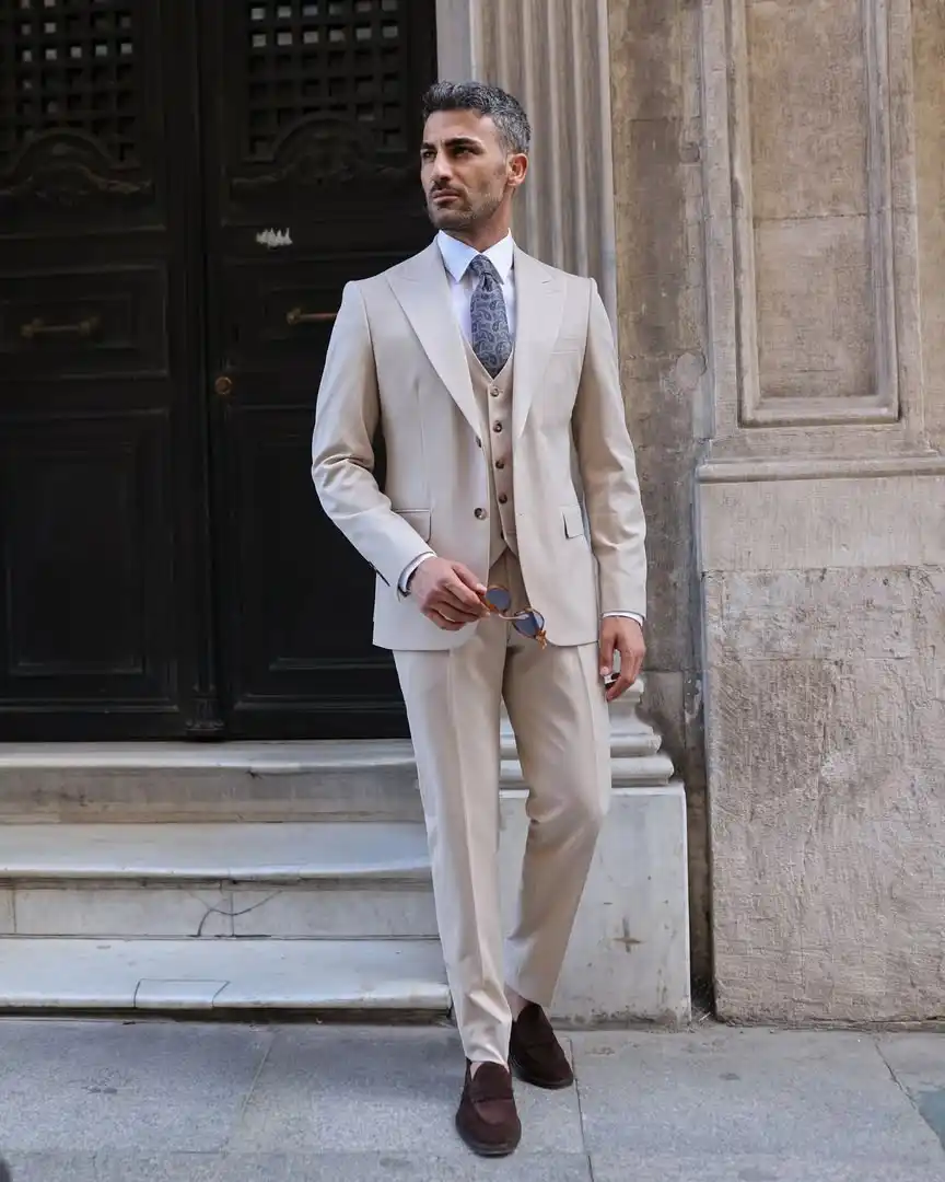 6. Cream Three Piece Suit