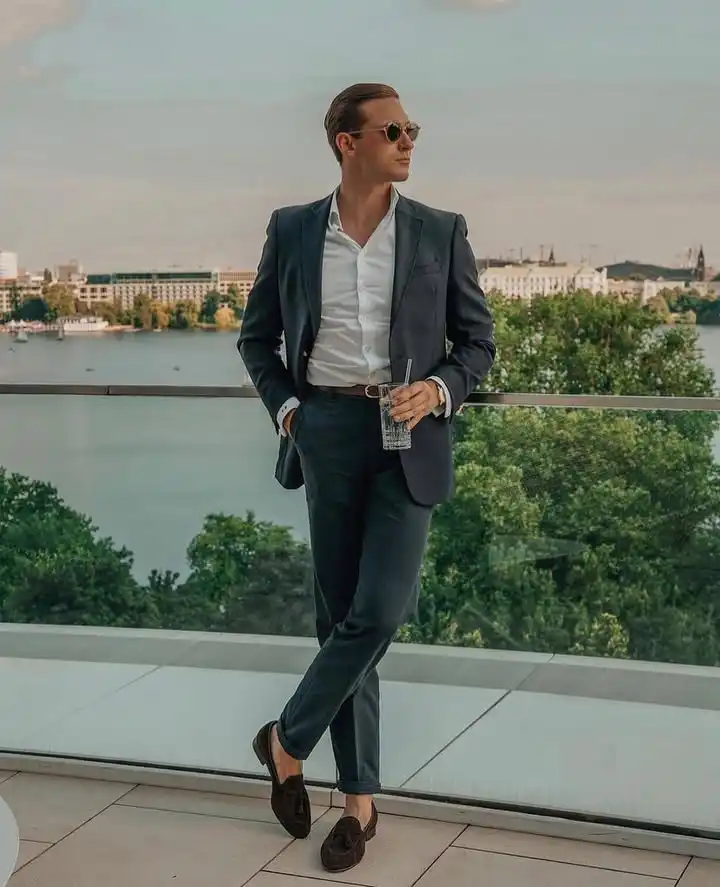 11. Charcoal Suit With an Open Collar and Tassel Loafers