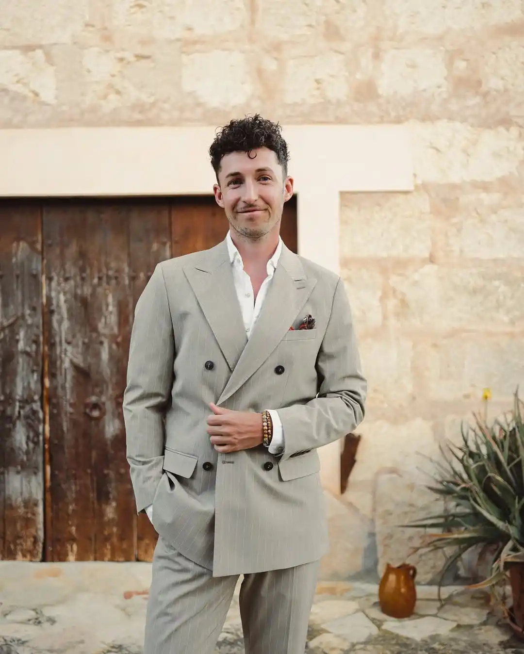 6. Pinstripe Double Breasted Suit with Open Collar