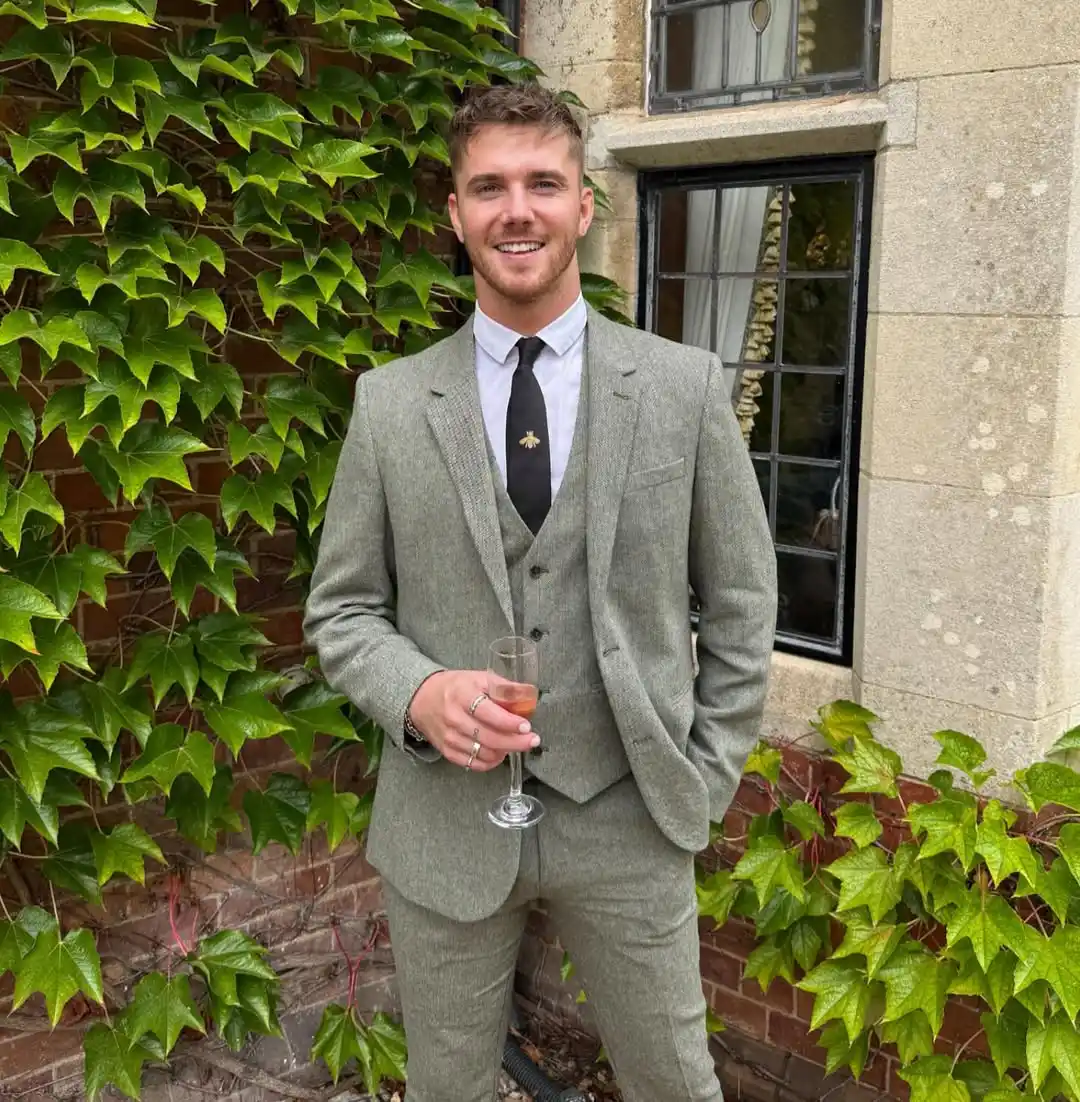 10. Sage Green Tweed Suit with Black Tie