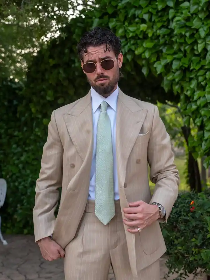 9. Tan Pinstripe Suit with Sage Green Tie