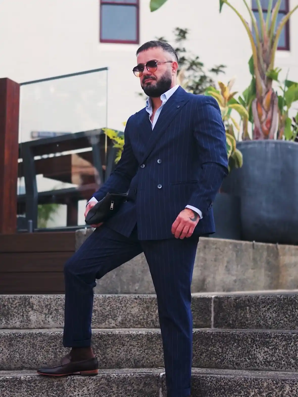 4. Navy Pinstripe Suit with Open Collar