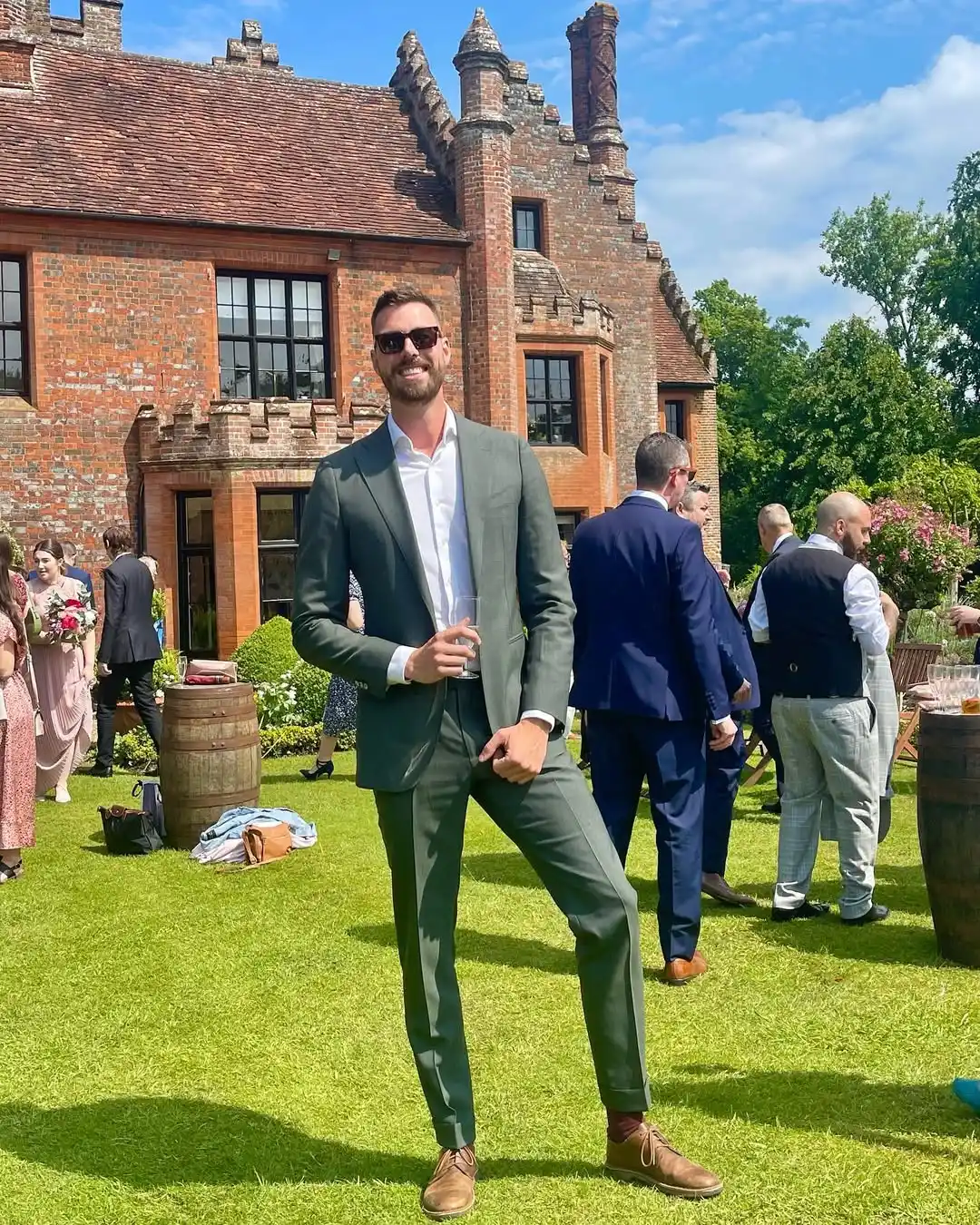 6. Olive Green Suit With Open Collar Shirt