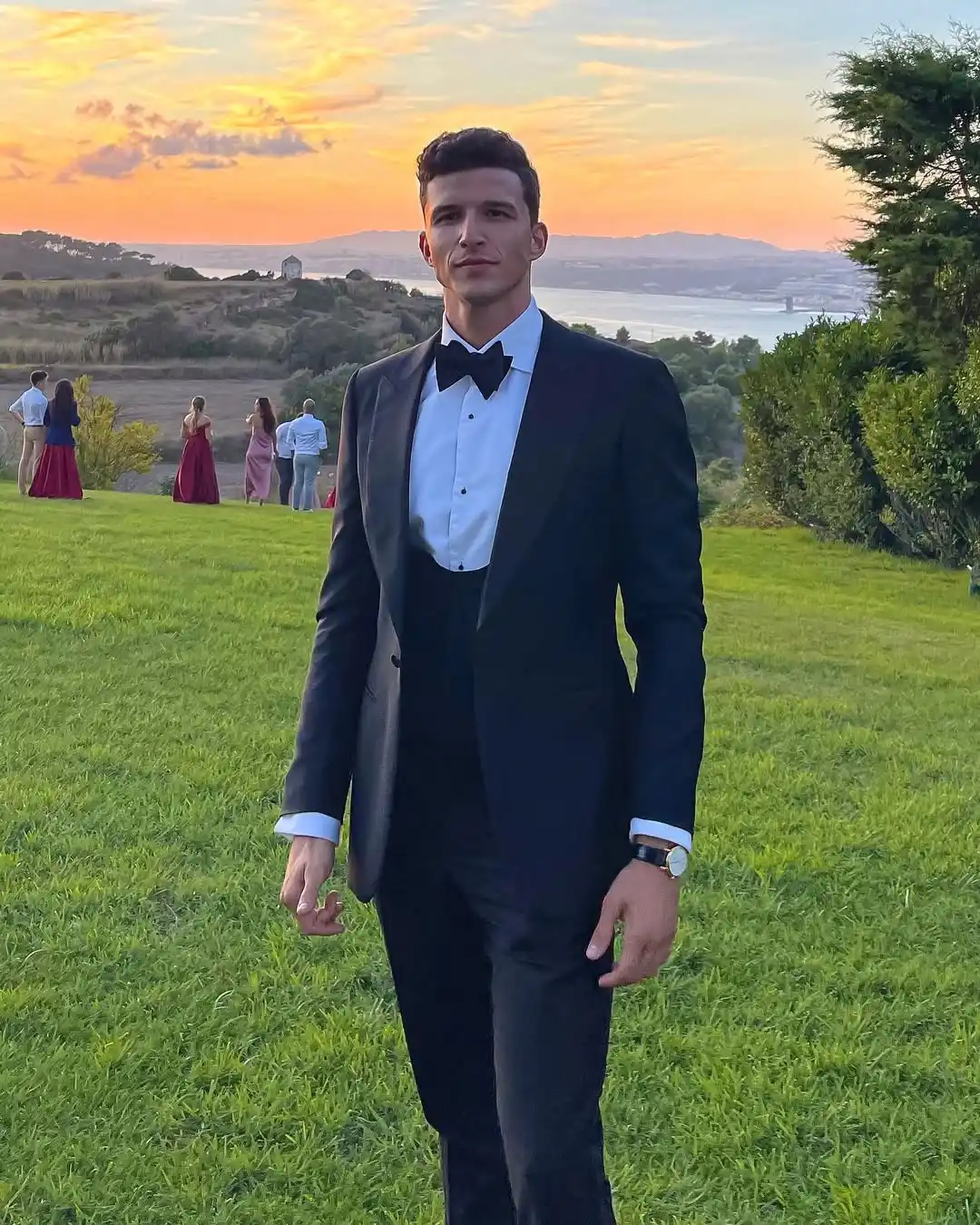 3. Navy Tuxedo With Waistcoat And Bow Tie