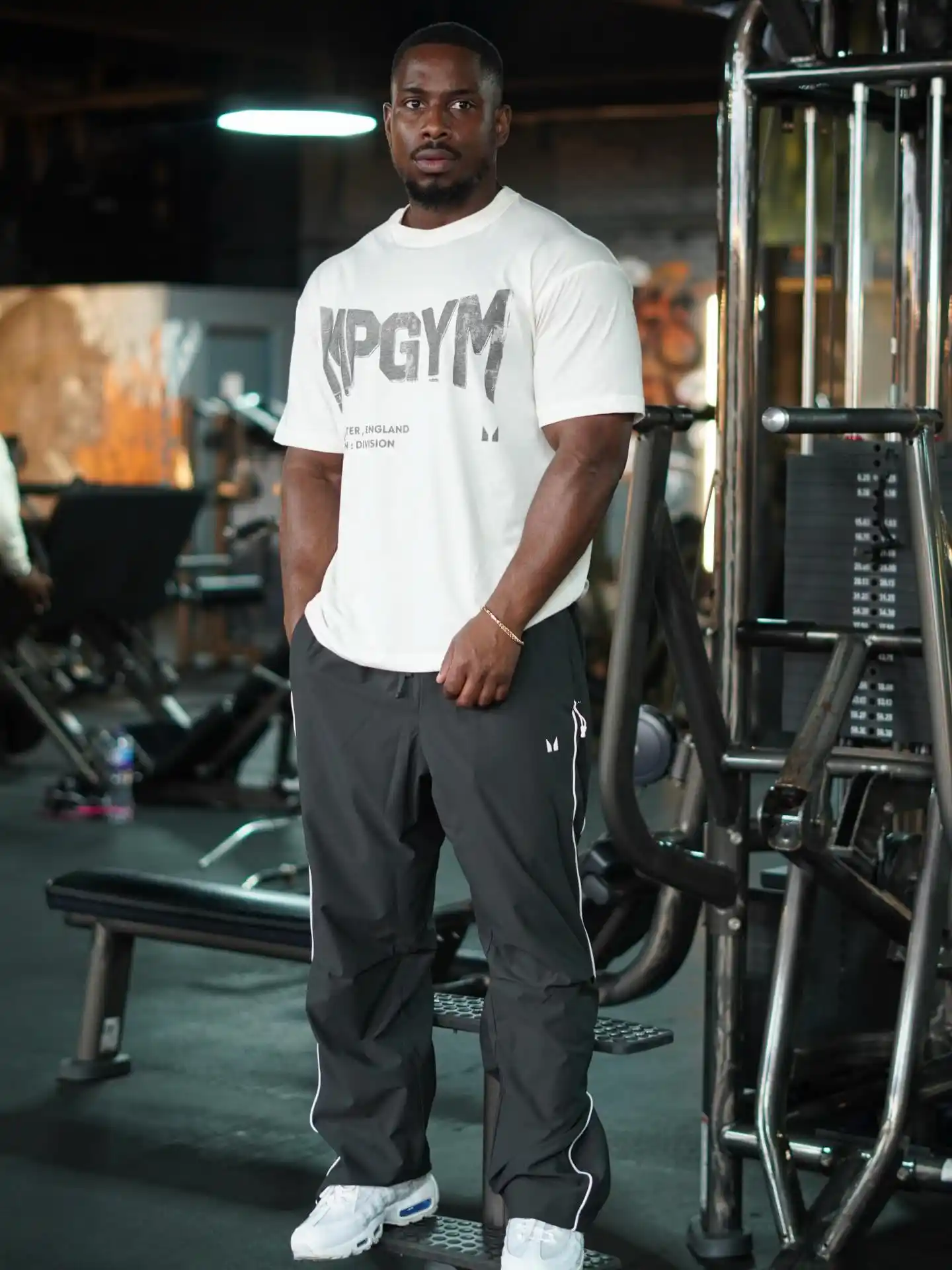 2. Oversized White Graphic Tee with Track Pants