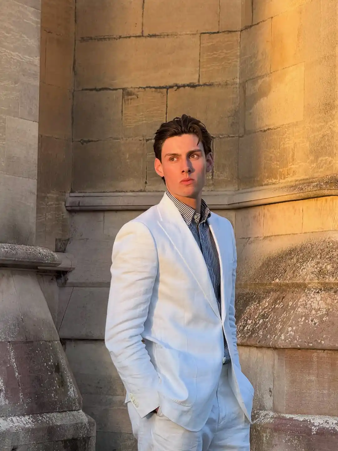 10. White Linen Suit With Open Collar
