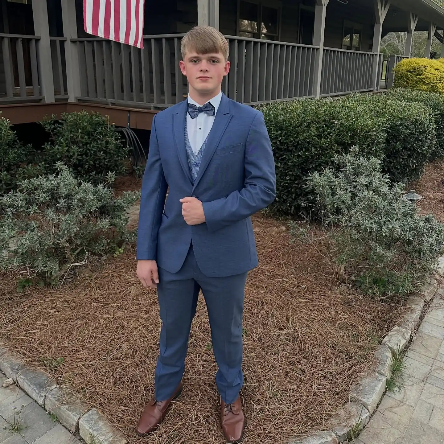 9. Steel Blue Suit With Bow Tie