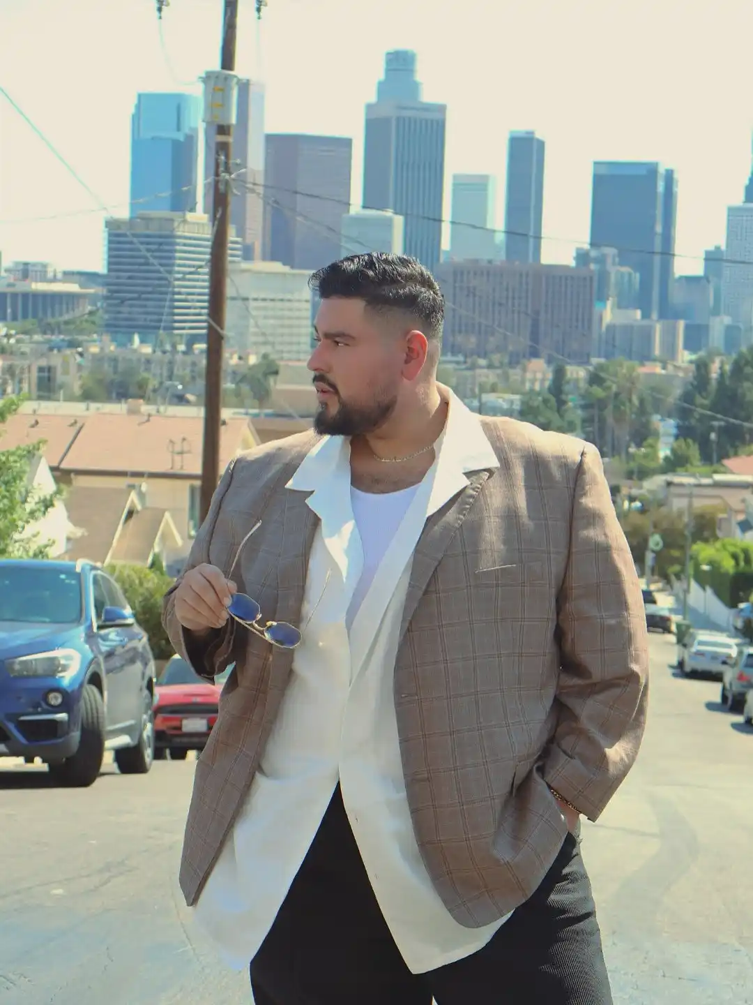 Wedding Guest Outfit for Plus Size Men: 15 Stylish Ideas 13 8. Layered Windowpane Blazer with White Tank