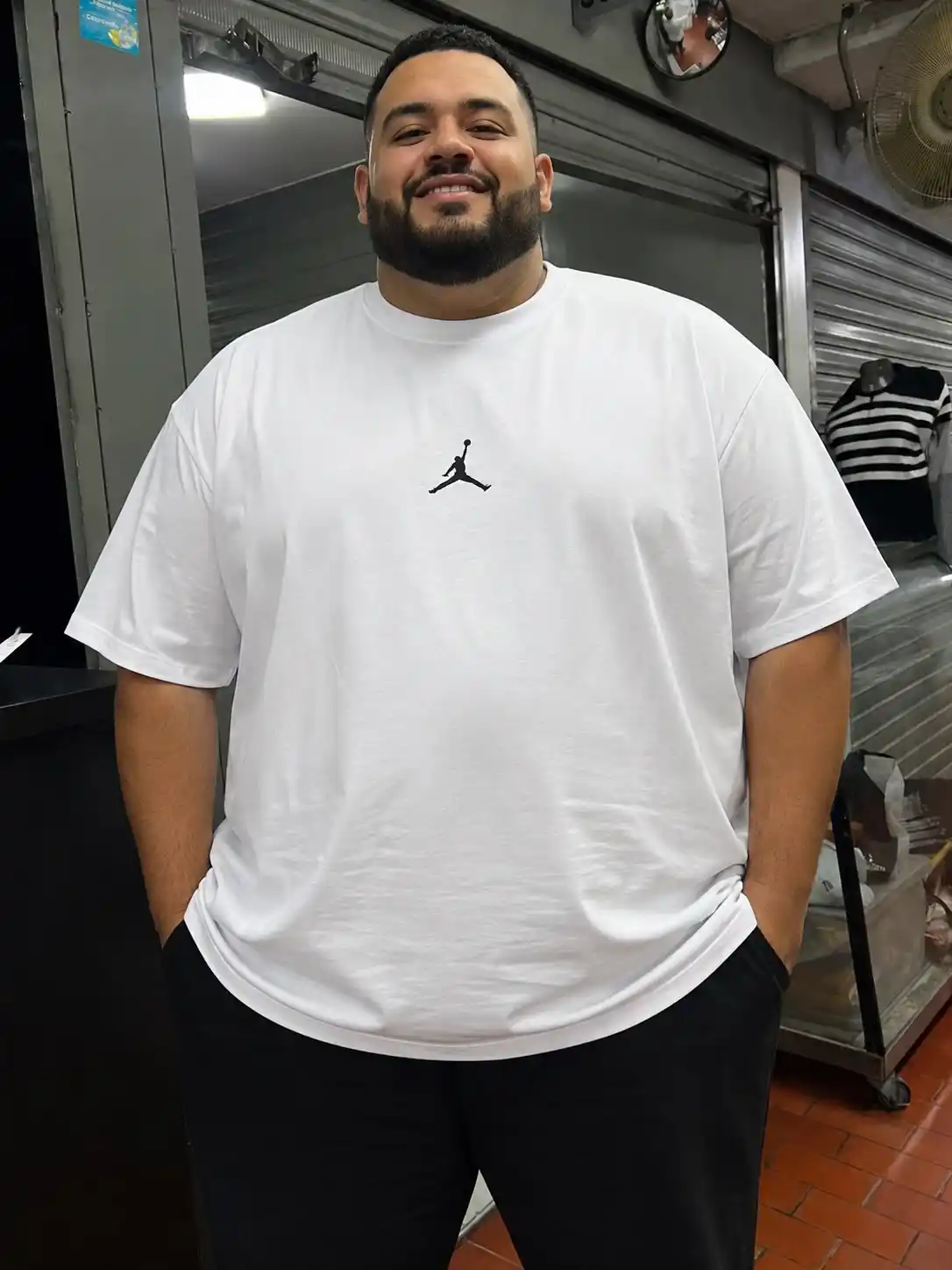 3. Oversized White Graphic Tee