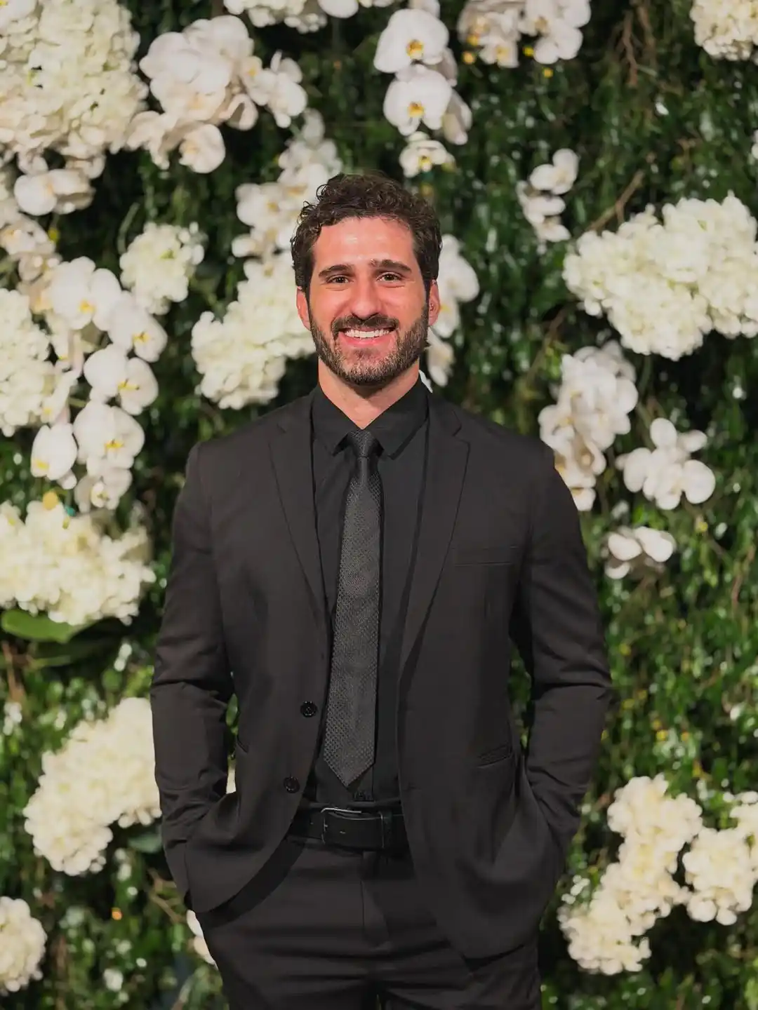 8. Charcoal Black Suit with Textured Tie
