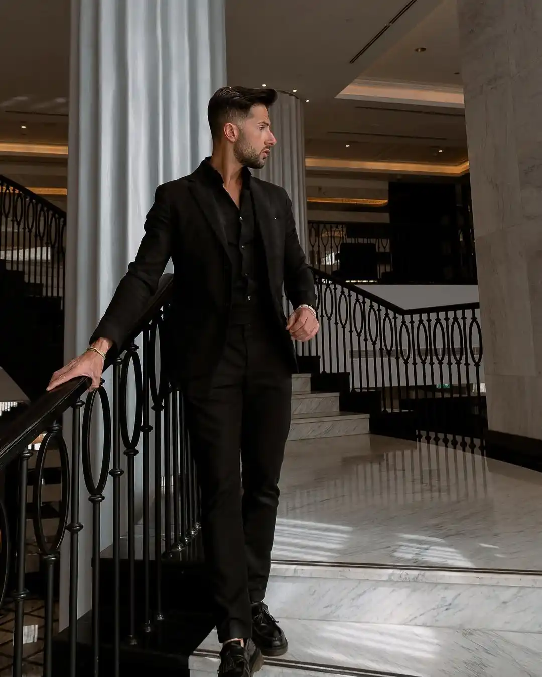 2. All Black Suit with Open Collar Shirt