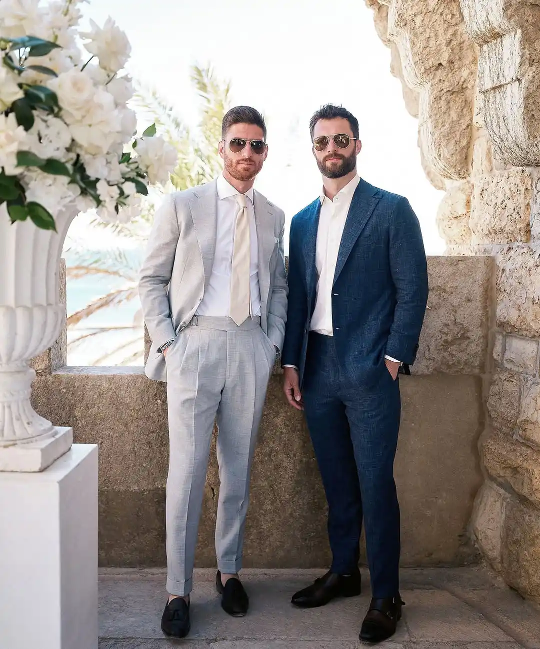 12. Grey Suit with Tie and Navy Suit Open Collar