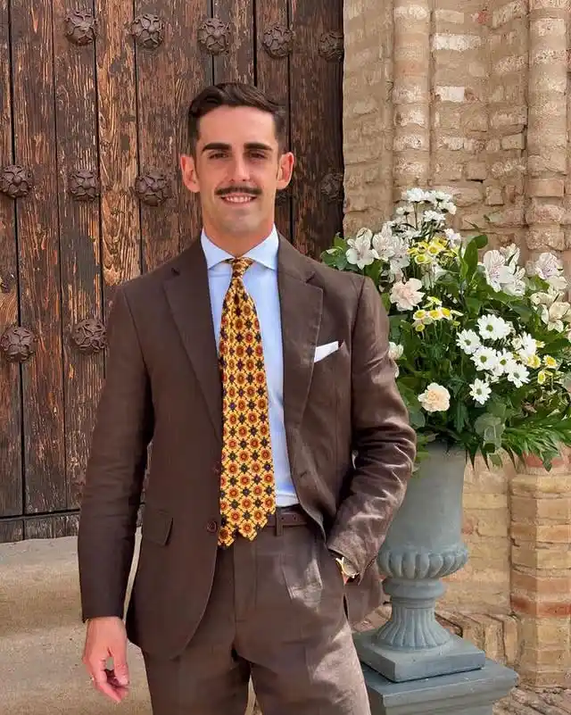 7. Brown Suit with Patterned Tie
