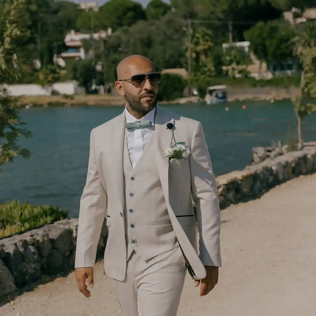1. Beige Three Piece Suit