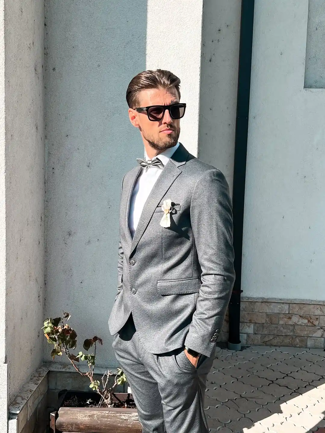 4. Grey Suit with Silver Bow Tie