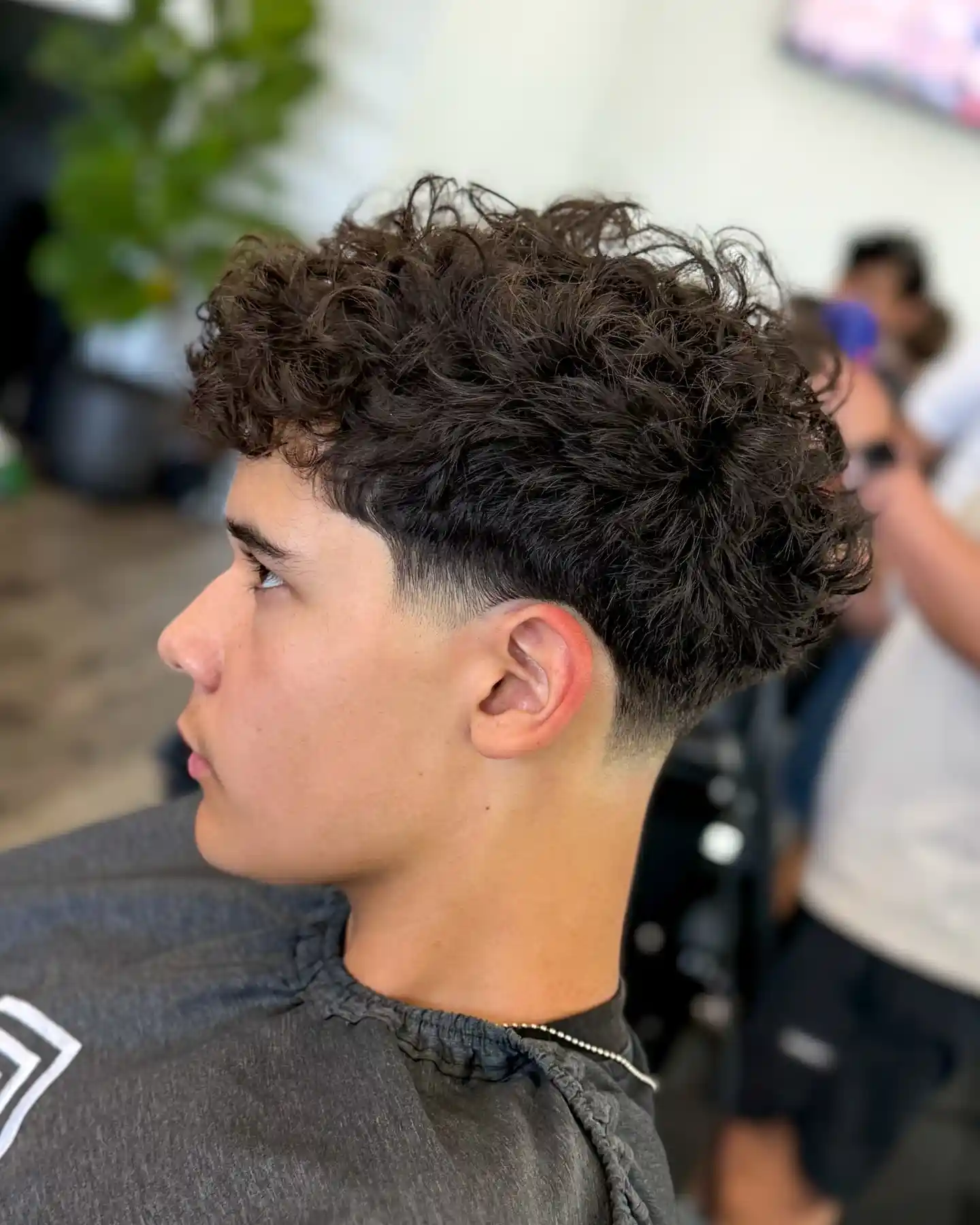 10. Loose, Undefined Curls Get a Softer Fade to Match Their Texture
