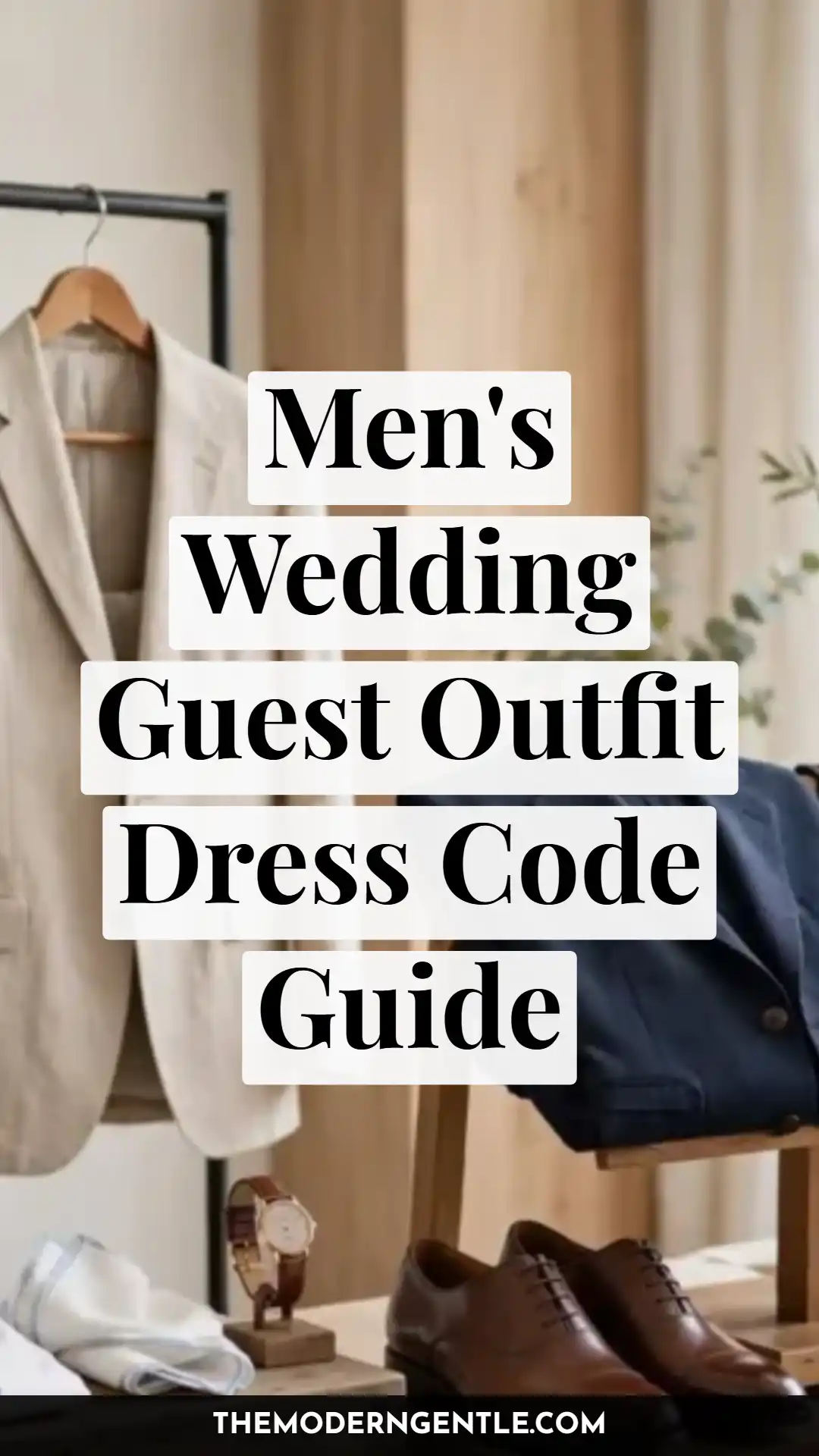 A men's wedding guest dress code guide pin featuring neutral menswear on a wooden clothing rack: a beige linen blazer on a hanger, a folded navy blazer draped over a chair, polished brown leather dress shoes, a folded pocket square, and a brown leather watch arranged below. Text overlay reads "Men's Wedding Guest Outfit Dress Code Guide," pointing to formal menswear essentials and cocktail attire styling for men.