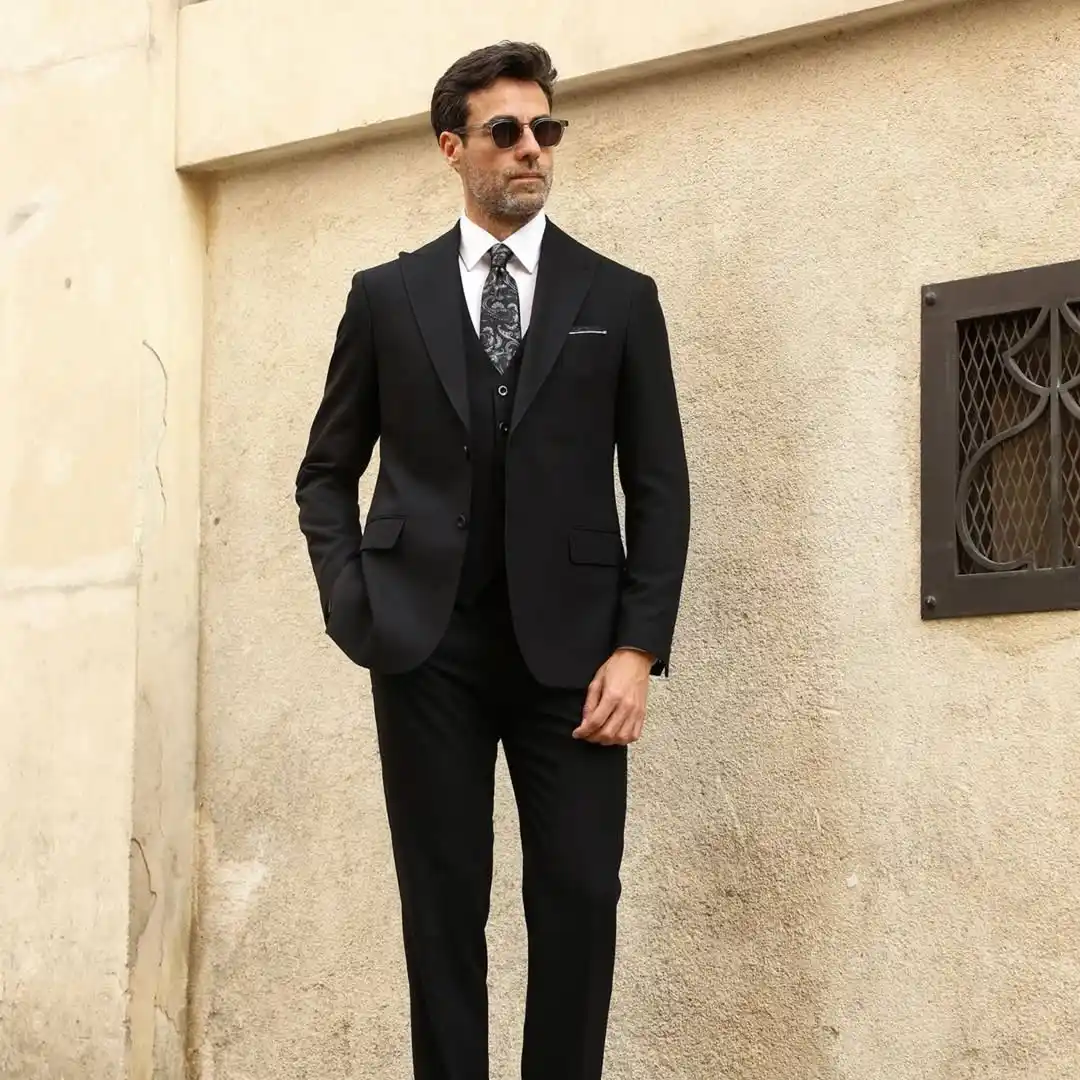 6. Three Piece Suit with Paisley Tie
