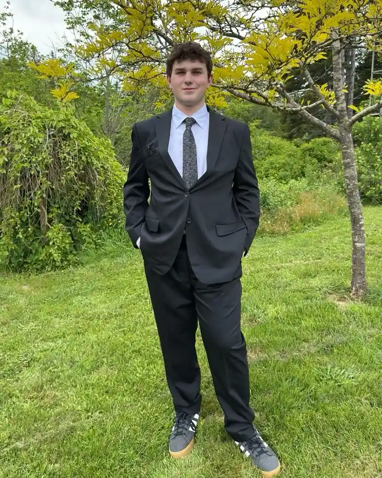 Charcoal Suit With Grey Sneakers for an Outdoor Ceremony