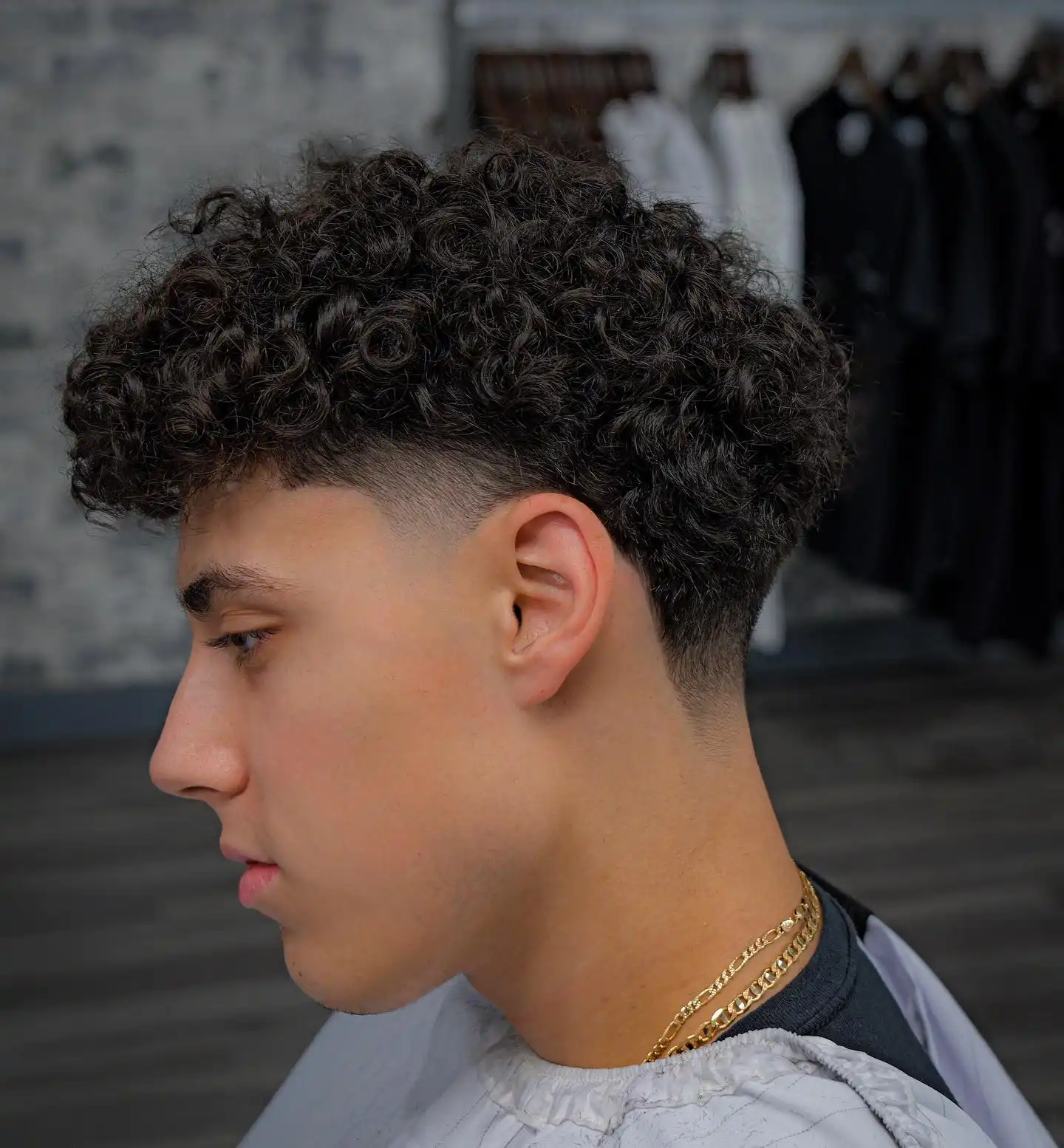 3. Boxed Curl Top with Taper Fade