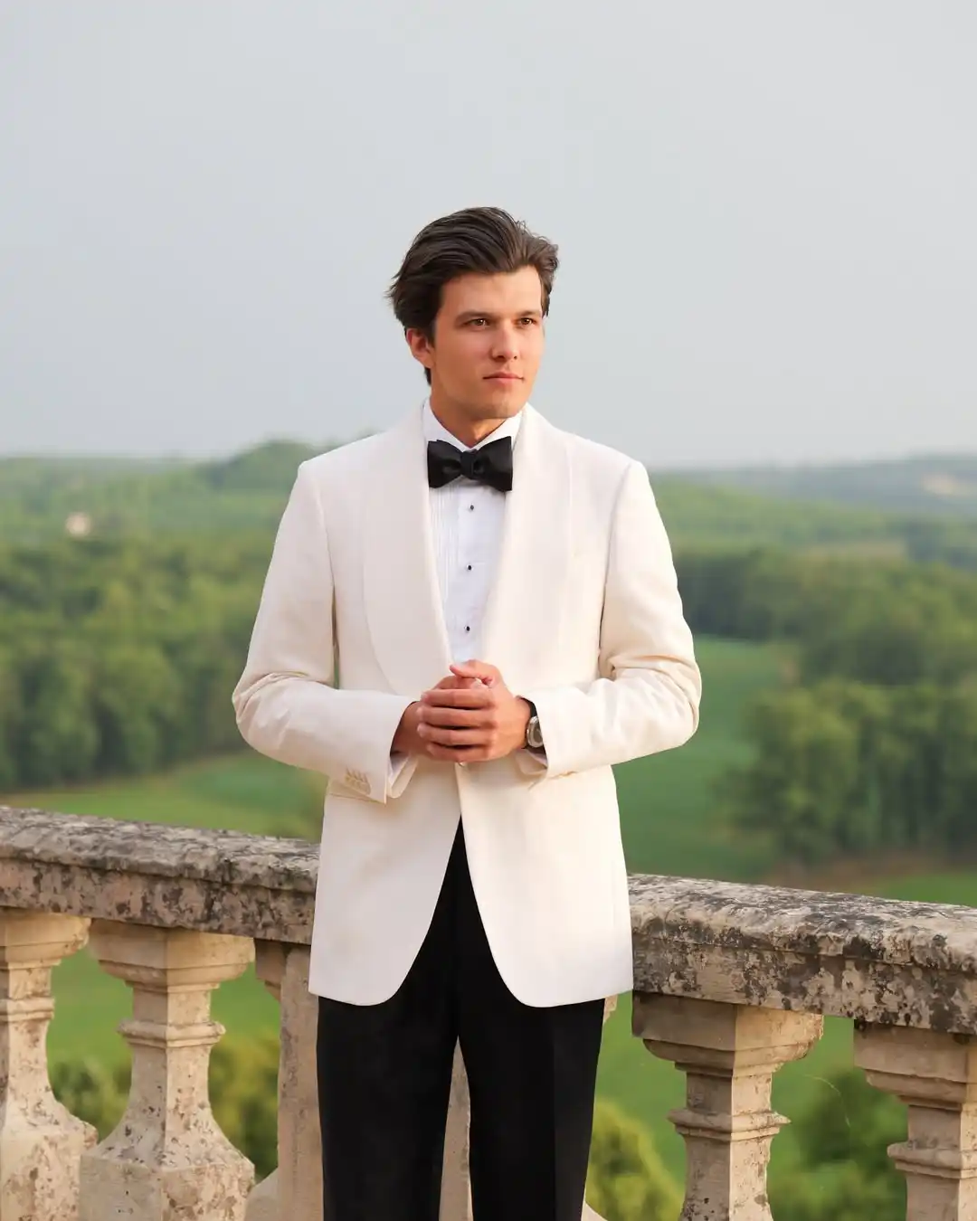 15 Winter Wedding Guest Outfit Ideas for Men 8 6. Ivory Dinner Jacket with Black Trousers