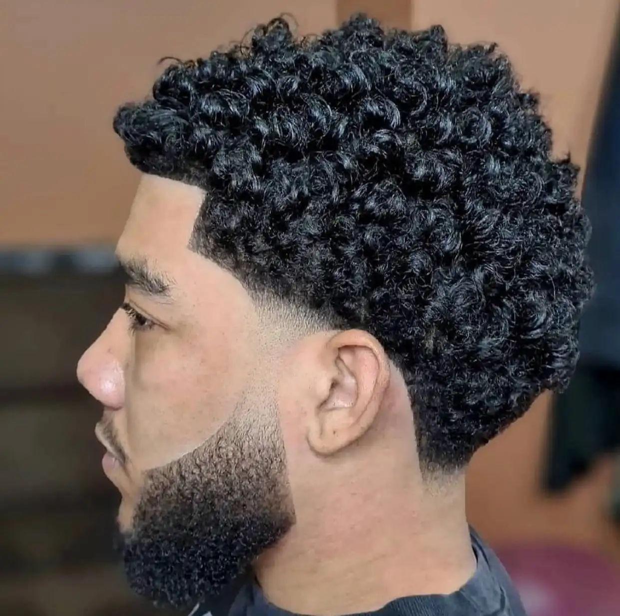 13. Full Curl Volume with Sharp Beard Fade