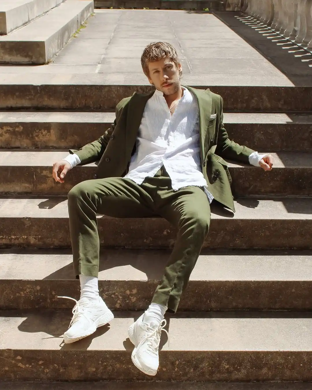 3. Olive Suit with White Sneakers