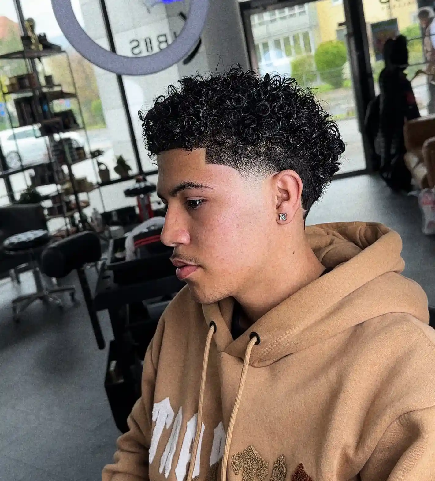 4. A Sharp Side Part Cut Straight Through the Curl