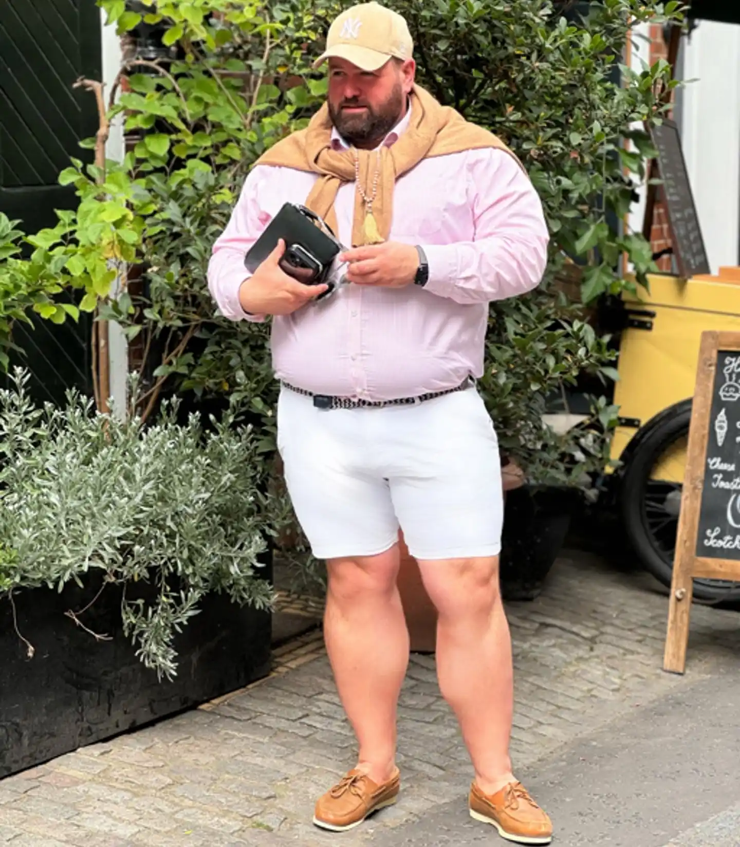 11. Pink Shirt, White Shorts, and Boat Shoes