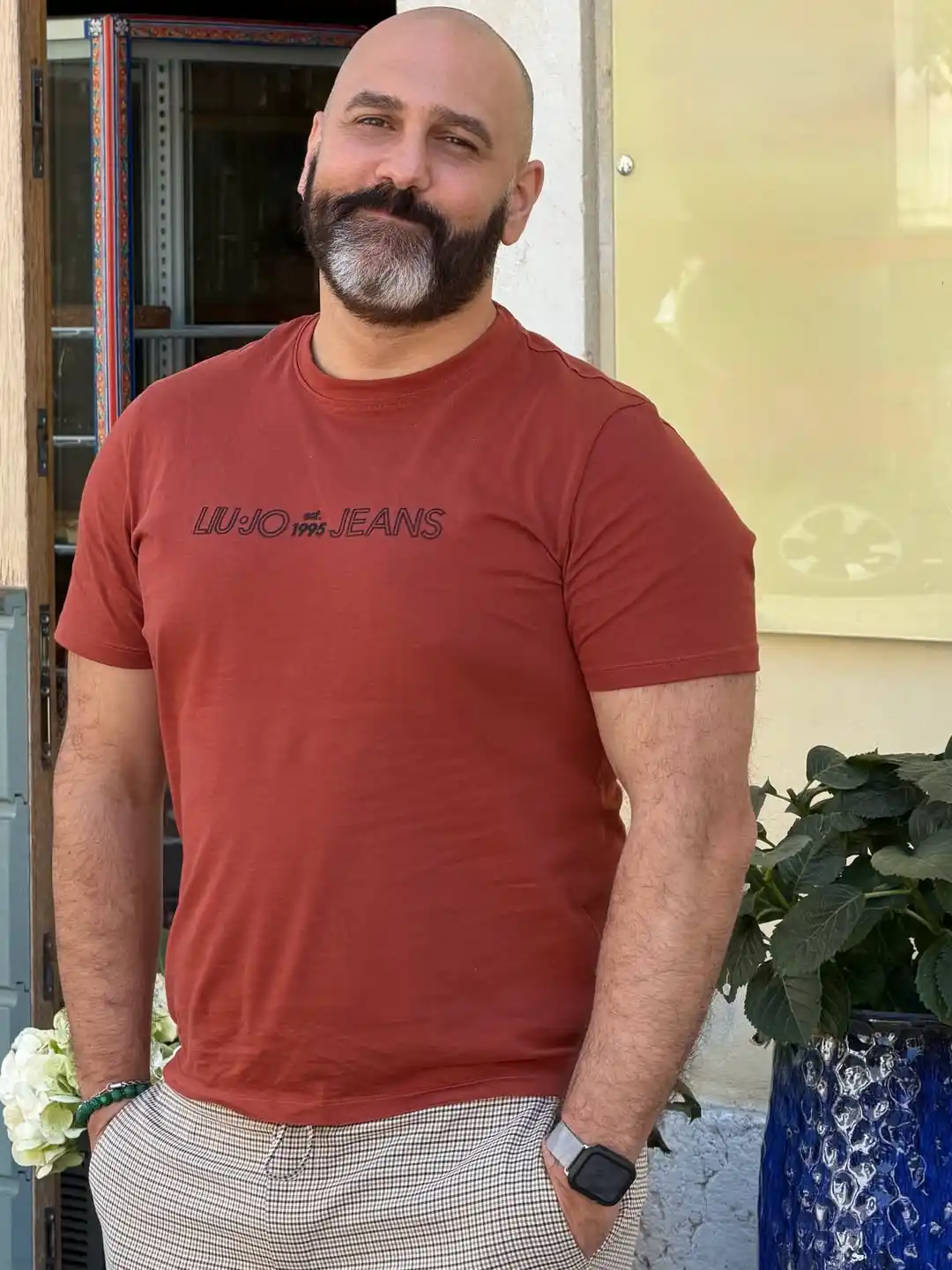 8. Branded Tee With Checked Trousers