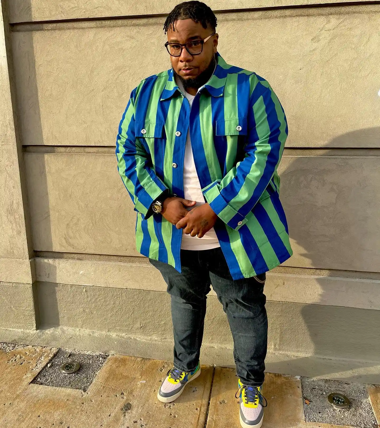 11 Spring Outfits for Plus Size Men Worth Saving Right Now 4 3. Bold Striped Overshirt with Denim